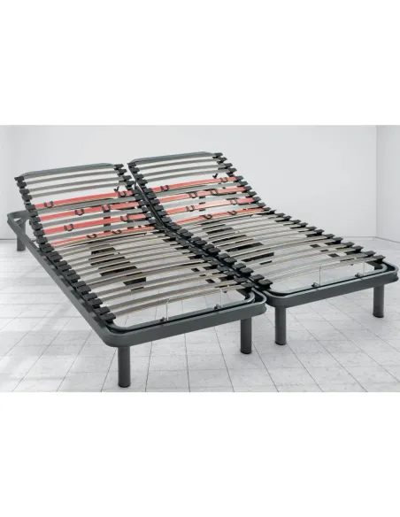 Electric adjustable bed frame with two adjustable sections in a room, showing independent adjustment