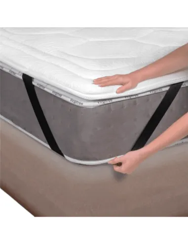 Hand adjusting the Viscogel Cashmere memory foam topper on the mattress