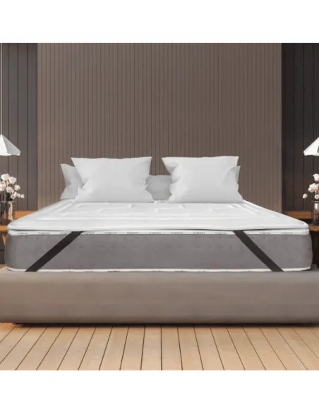 Double bed with Viscogel Cashmere memory foam topper in a decorated room