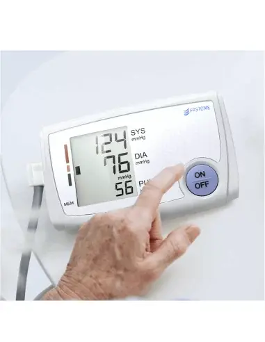 Person using the FASTOME blood pressure monitor to measure blood pressure