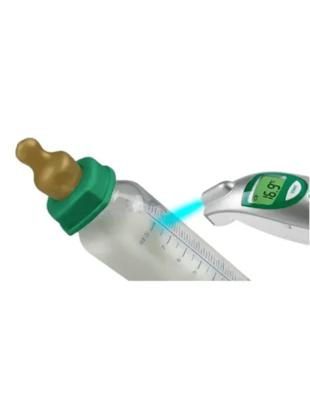 Medisana FTN thermometer measuring the temperature of a baby bottle
