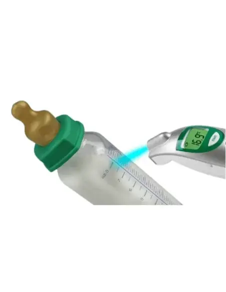 Medisana FTN thermometer measuring the temperature of a baby bottle