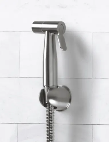 Fastome ozone tap installed on the wall with flexible hose