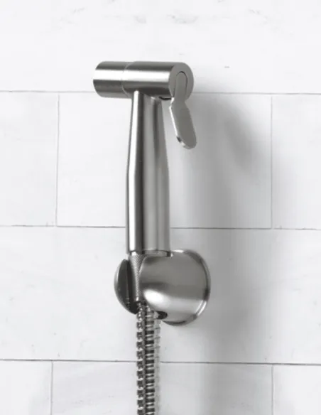 Fastome ozone tap installed on the wall with flexible hose