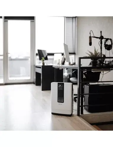 Purificador de aire UV en oficina moderna proporcionando aire limpio